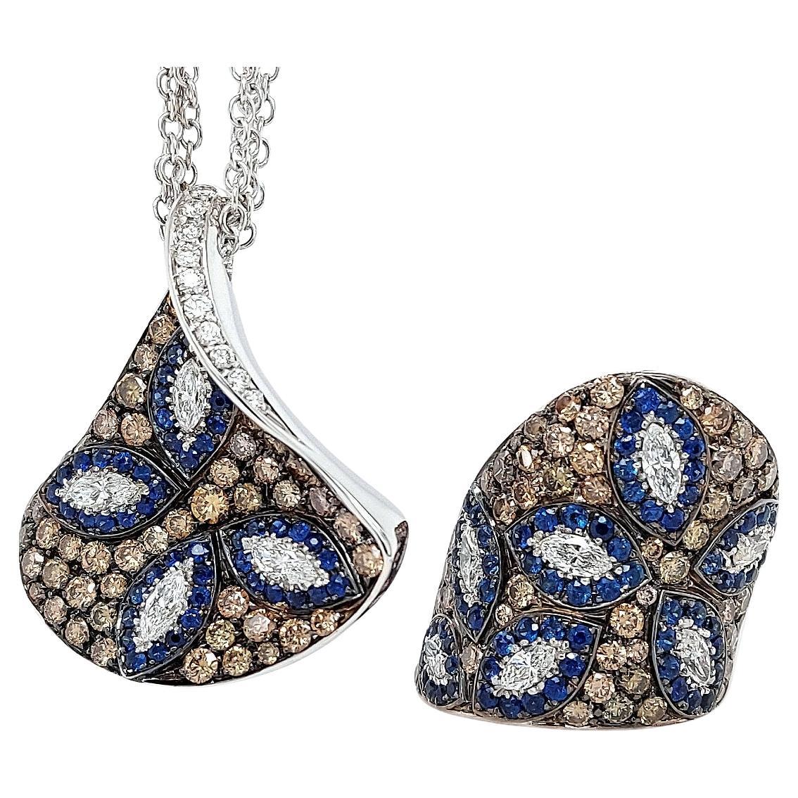 oro bianco 18 carati  Collana con ciondolo a triangolo con diamanti bianchi e marroni e zaffiro 

Incredibile collana realizzata a mano. Può essere acquistato con un anello abbinato.

Diamanti: Diamanti marroni e bianchi taglio brillante e marquise
