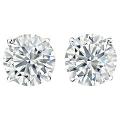 Orecchini con diamanti tondi naturali con incastonatura a cestello a 4 punte da 1,06t in oro bianco 14K