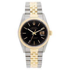 Montre Rolex Datejust bicolore en acier et or jaune, cadran noir, bracelet Jubilee, pour homme, référence 16233