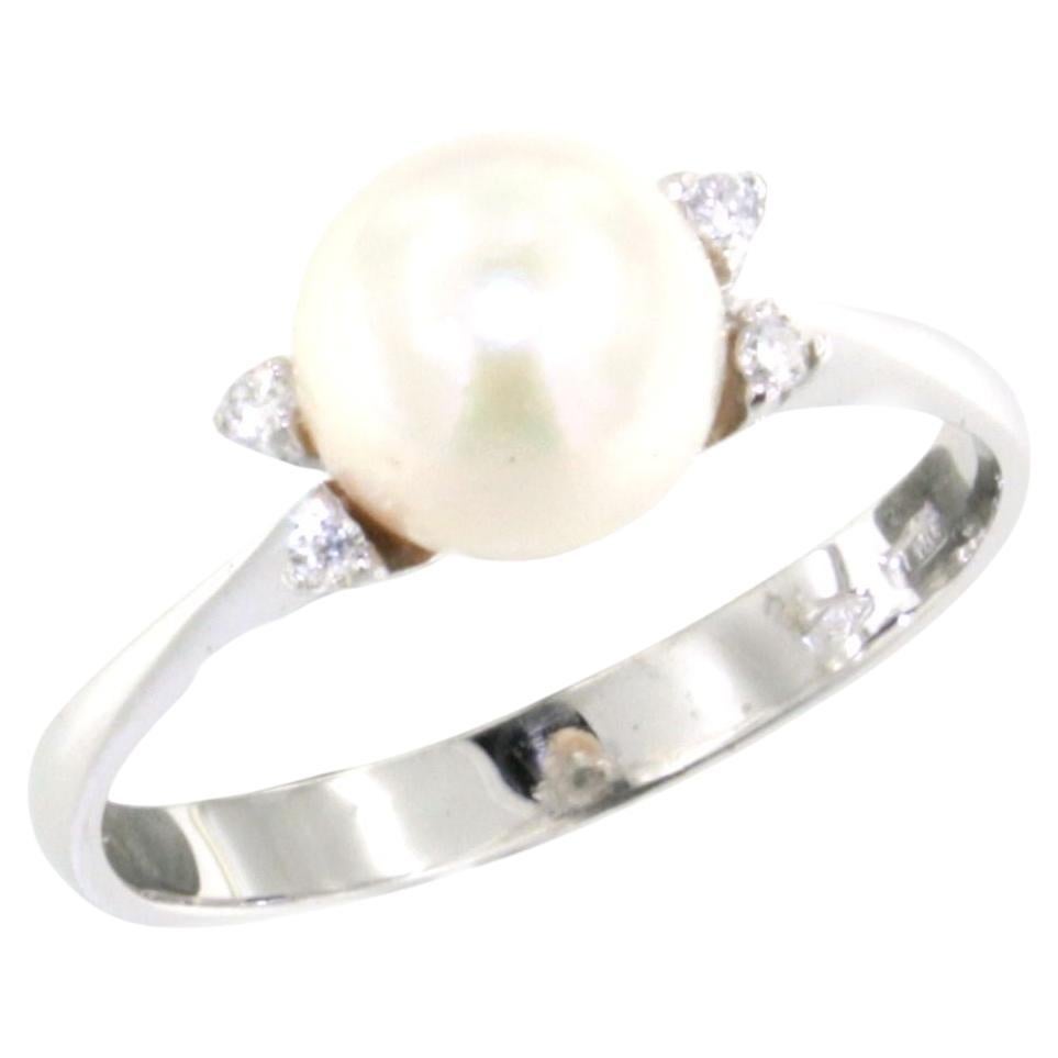 Anello classico senza tempo in oro bianco 18 Kt con diamanti bianchi e perle da cocktail