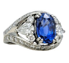 Oval Mixed Cut Blue Sapphire and Multi Diamond Cocktail Ring in Platinum
