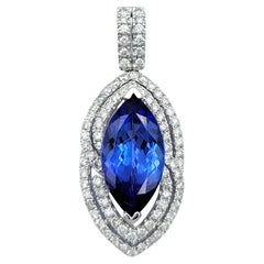 Ciondolo con tanzanite taglio marquise e doppio halo di diamanti in oro bianco 14 carati
