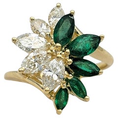 Marquise Cut Emerald and Diamond Flower Cluster Ring in 14 Karat Yellow Gold