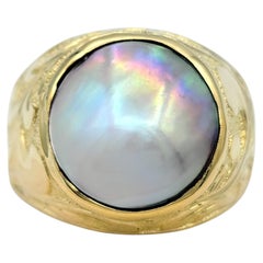 Large Mabe Pearl Solitaire Cocktail Ring with Swirl Motif 18 Karat Yellow Gold