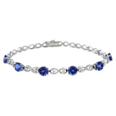 Alternating Tanzanite and Diamond Infinity Link Bracelet in 14 Karat White Gold