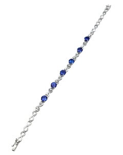 Alternating Tanzanite and Diamond Infinity Link Bracelet in 14 Karat White Gold