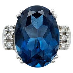 Oval Cut London Blue Topaz and Diamond Cocktail Ring in 14 Karat White Gold