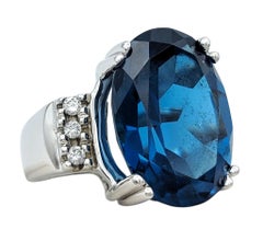 Oval Cut London Blue Topaz and Diamond Cocktail Ring in 14 Karat White Gold