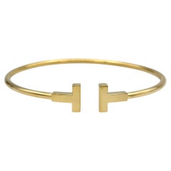 Tiffany & Co. Tiffany T Narrow Wire Bracelet in 18 Karat Yellow Gold