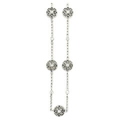 Floral Heart Motif Circle Station Necklace with Diamonds in 18 Karat White Gold