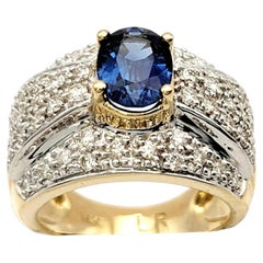 Oval Cut Natural Blue Sapphire and Pavé Diamond Wide Band Ring in 14 Karat Gold