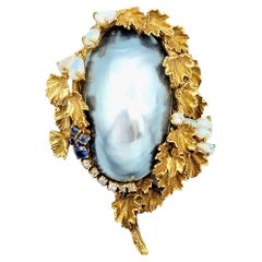 Broche/pendentif ancienne en or jaune avec perles de Tahiti, tanzanites, opales et diamants