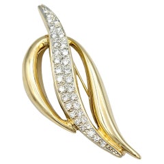 Round Brilliant Pavé Diamond Open Swirl Motif Brooch Set in 14 Karat Yellow Gold