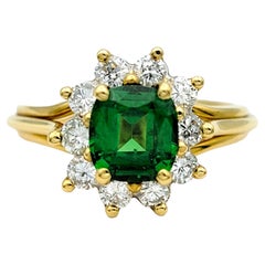 Tsavorite Garnet and Diamond Halo Ring with Split Shank in 18 Karat Yellow Gold