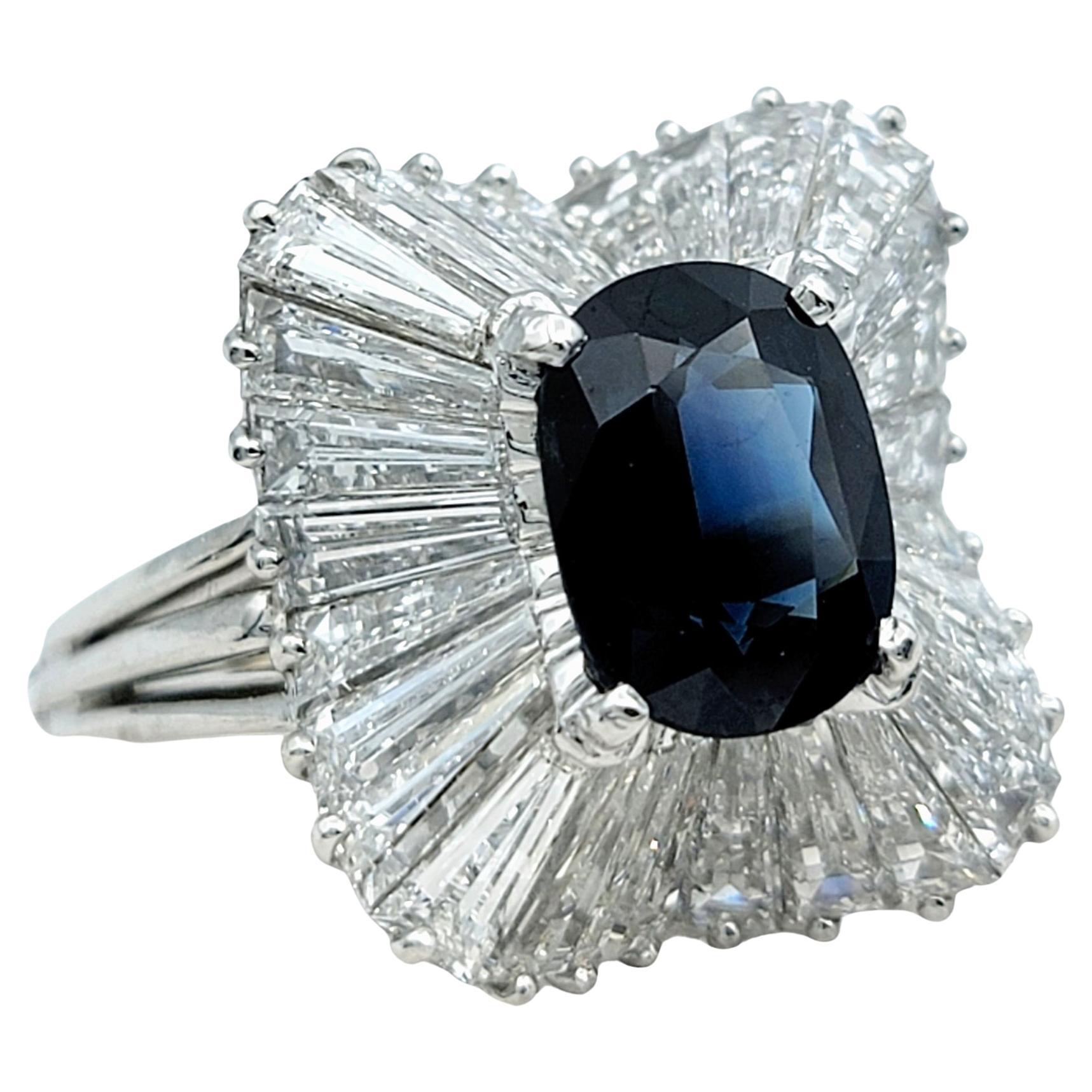 Oval Cut Blue Sapphire and Baguette Diamond Ballerina Style Ring in Platinum