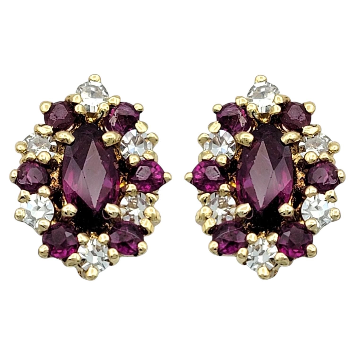 Marquise Shaped Ruby and Diamond Halo Stud Earrings in 14 Karat Yellow Gold For Sale