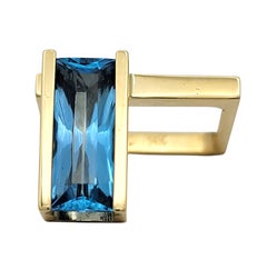 Robert Trisko Radiant Cut Blue Topaz Modernist Ring in 14 Karat Yellow Gold