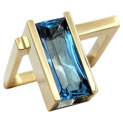 Robert Trisko Radiant Cut Blue Topaz Modernist Ring in 14 Karat Yellow Gold