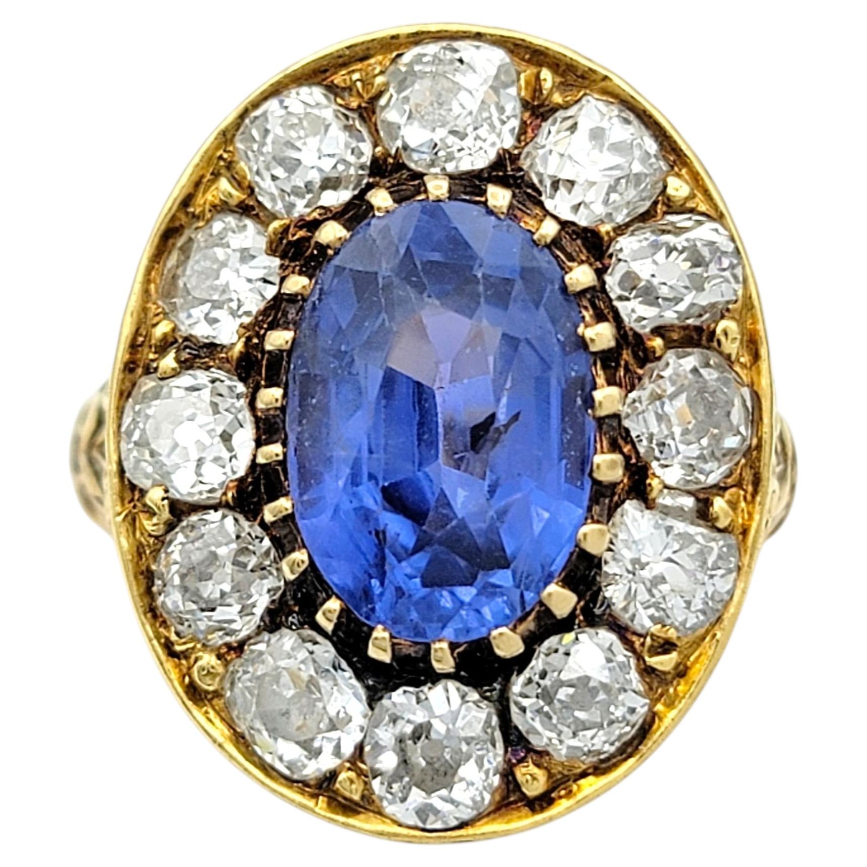 Vintage Blue Sapphire and Diamond Halo Cocktail Ring in 18 Karat Yellow Gold