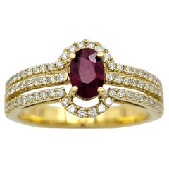Oval Cut Ruby and Multi Row Pavé Diamond Band Ring in 18 Karat Yellow Gold