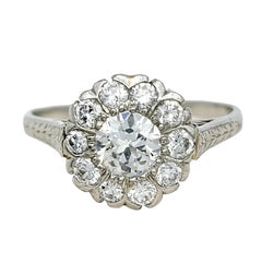 Antique Belle Époque Diamond Flower Halo Engagement Ring in Platinum