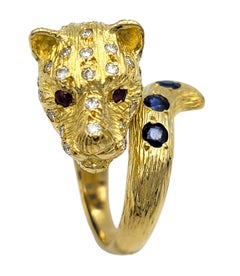 Panther Motif Bypass Ring with Blue Sapphires, Rubies, & Diamonds 18 Karat Gold