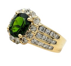 Oval Cut Green Tourmaline Ring with Multi Row Diamond Band 14 Karat Yellow Gold