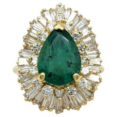Pear Cut Emerald and Multi Diamond Halo Cocktail Ring in 14 Karat Yellow Gold