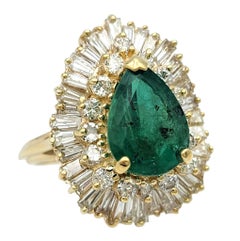 Pear Cut Emerald and Multi Diamond Halo Cocktail Ring in 14 Karat Yellow Gold