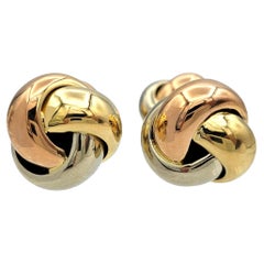Vintage-Manschettenknöpfe „Love Knot“ von Cartier aus dreifarbigem 18-Karat-Gold