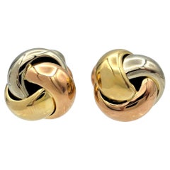 Vintage-Manschettenknöpfe „Love Knot“ von Cartier aus dreifarbigem 18-Karat-Gold