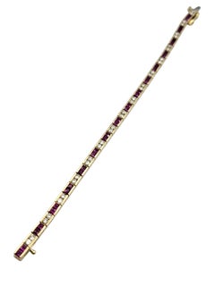 Alternating Ruby and Diamond Line Bracelet in 14 Karat Yellow Gold