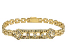 Bracciale con maglie a forma di pantera e diamanti rotondi scorrevoli in oro giallo 18 carati