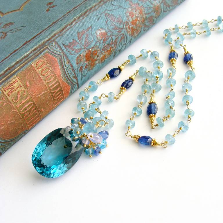 Apatite Kyanite Necklace with Luxe Prasiolite Pendant -  Mabelle Necklace.

A hand-linked chain of gorgeous aqua apatite beads is intermittently punctuated with rich royal blue kyanite beads, stationed along the chain.  This beautiful and rich