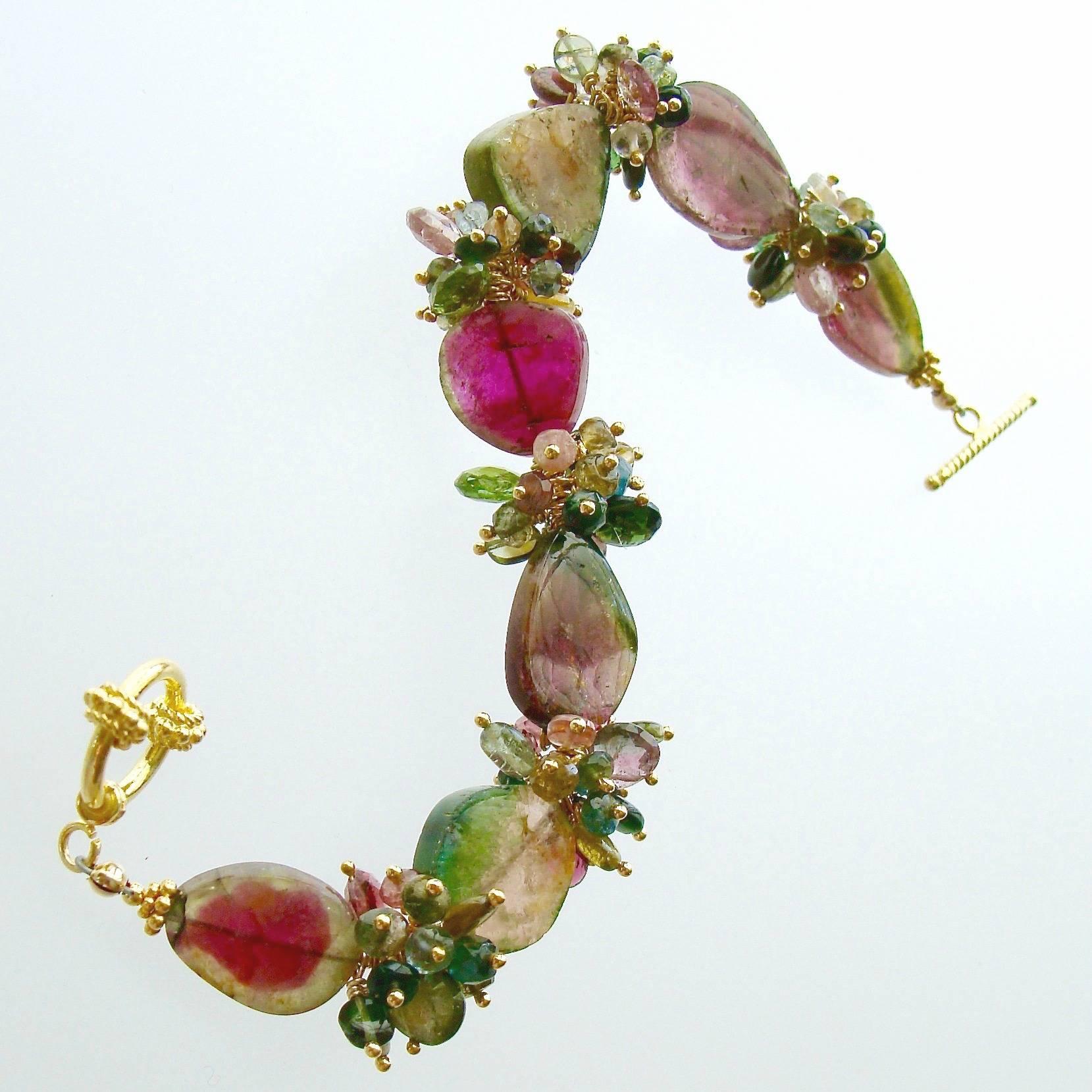 Clarissa III Bracelet.

If you love tourmaline – this luxe bracelet will surely make your hear skip a beat!  Gorgeous pink and green slices of multicolored watermelon tourmaline slices are interspersed with delicate cluster frills in a cacophony