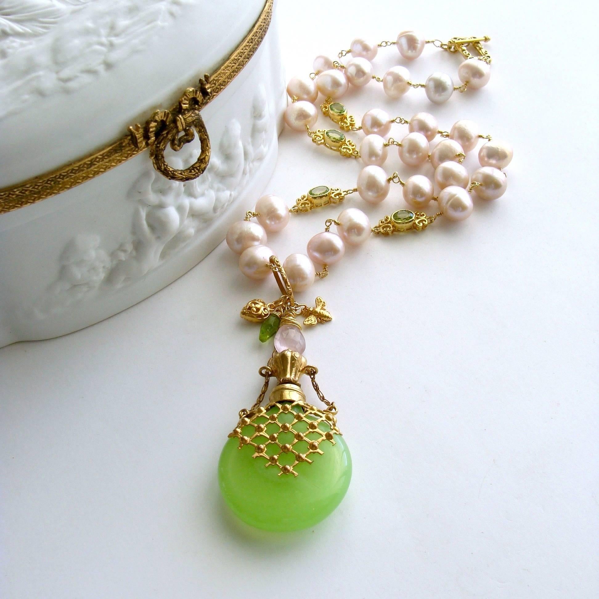 Majory Necklace.

A stunning kiwi green Victorian opaline scent bottle (circa 1880) - embellished with  a mesh metal cross-hatch design in gold gilt - has now become the featured pendant of this new necklace design.  The original finger loop and