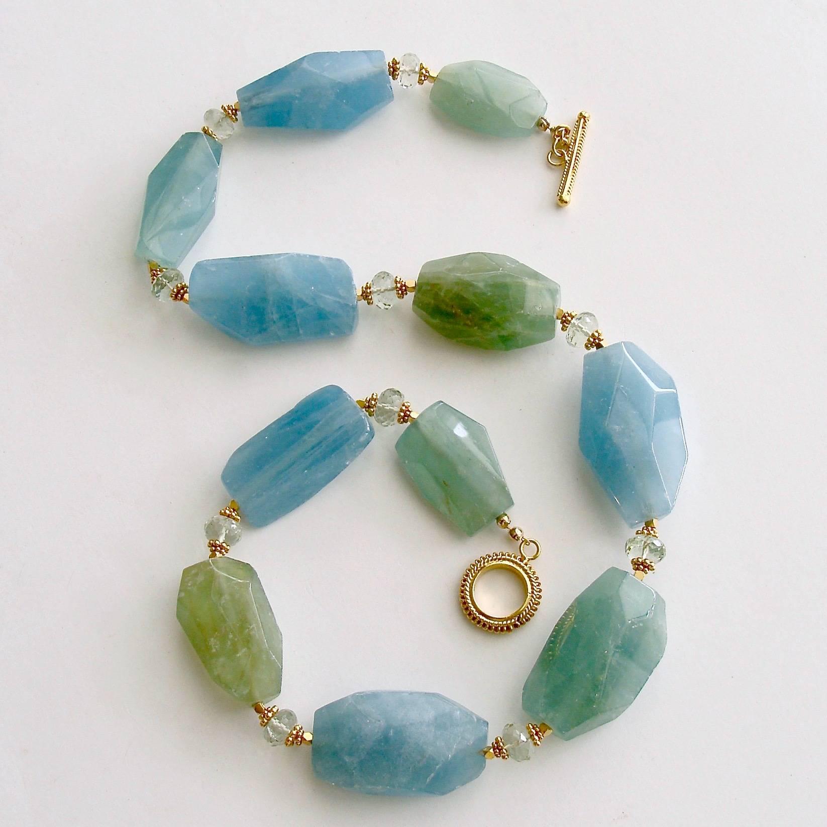 Brynn III Necklace.

Luxe, natural and organic faceted aquamarine nuggets, ranging in colors from watery aqua blue to fresh spring greens, comprise this mesmerizing necklace.  Each of the generous nuggets is separated with a delicate micro faceted