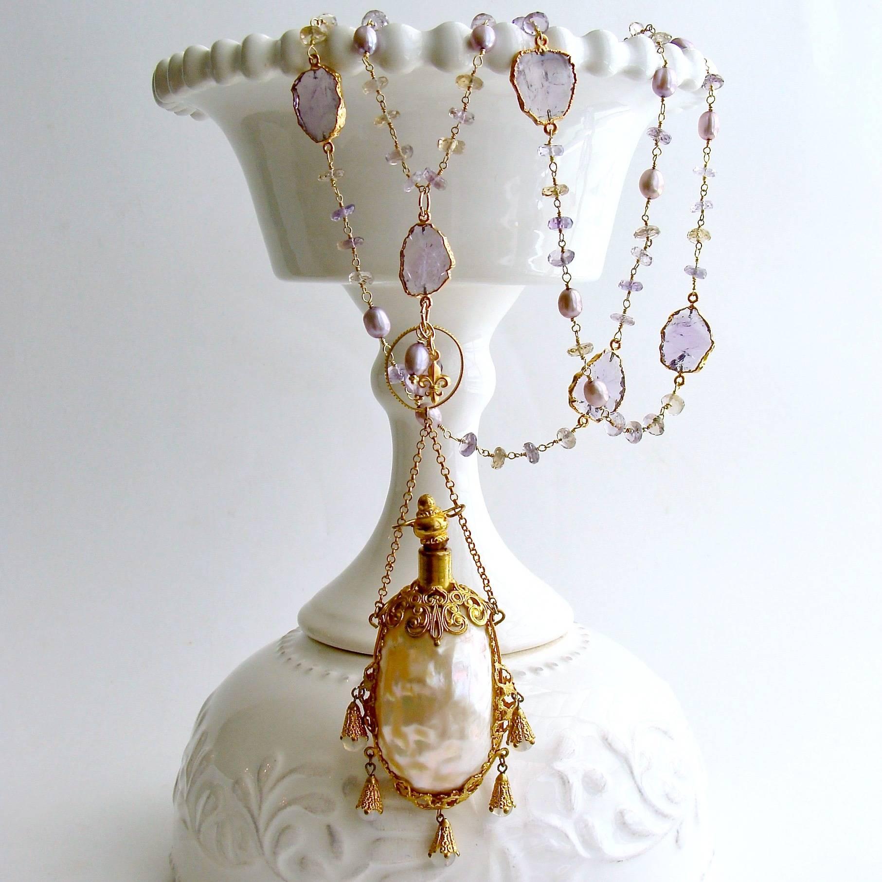 Guinevere III Necklace.

The history of perfume during the Regency Era is a fascinating subject and this delicate necklace pays homage to the creativity and workmanship of that time.  Sparkling a delicately shaded ametrine rondelles are hand linked