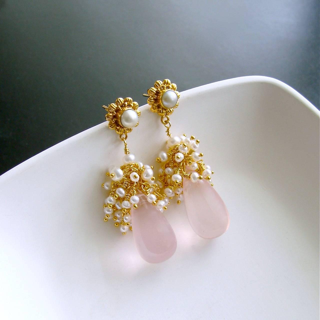 Pétales de Rose III Earrings.

Delicate blush pink and diaphanous smooth-cut rose quartz briolettes are crowned with a frothy explosion of creamy white seed pearls to create a traditional, yet uniquely feminine, pair of  earrings. This ladylike