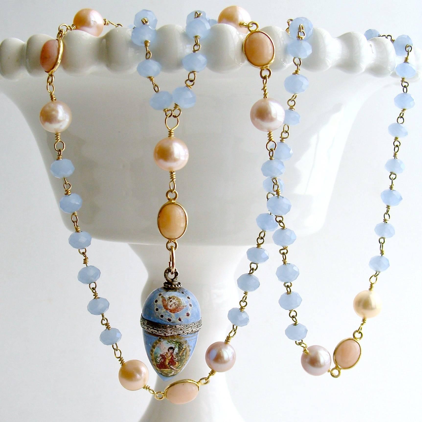 Brezza Dolce IV Necklace.

Delicate powder blue hand-linked chalcedony chain is periodically intercepted with stations of creamy pearls flanking gold vermeil Peruvian pink opal connectors to create a gorgeous backdrop for a most charming antique