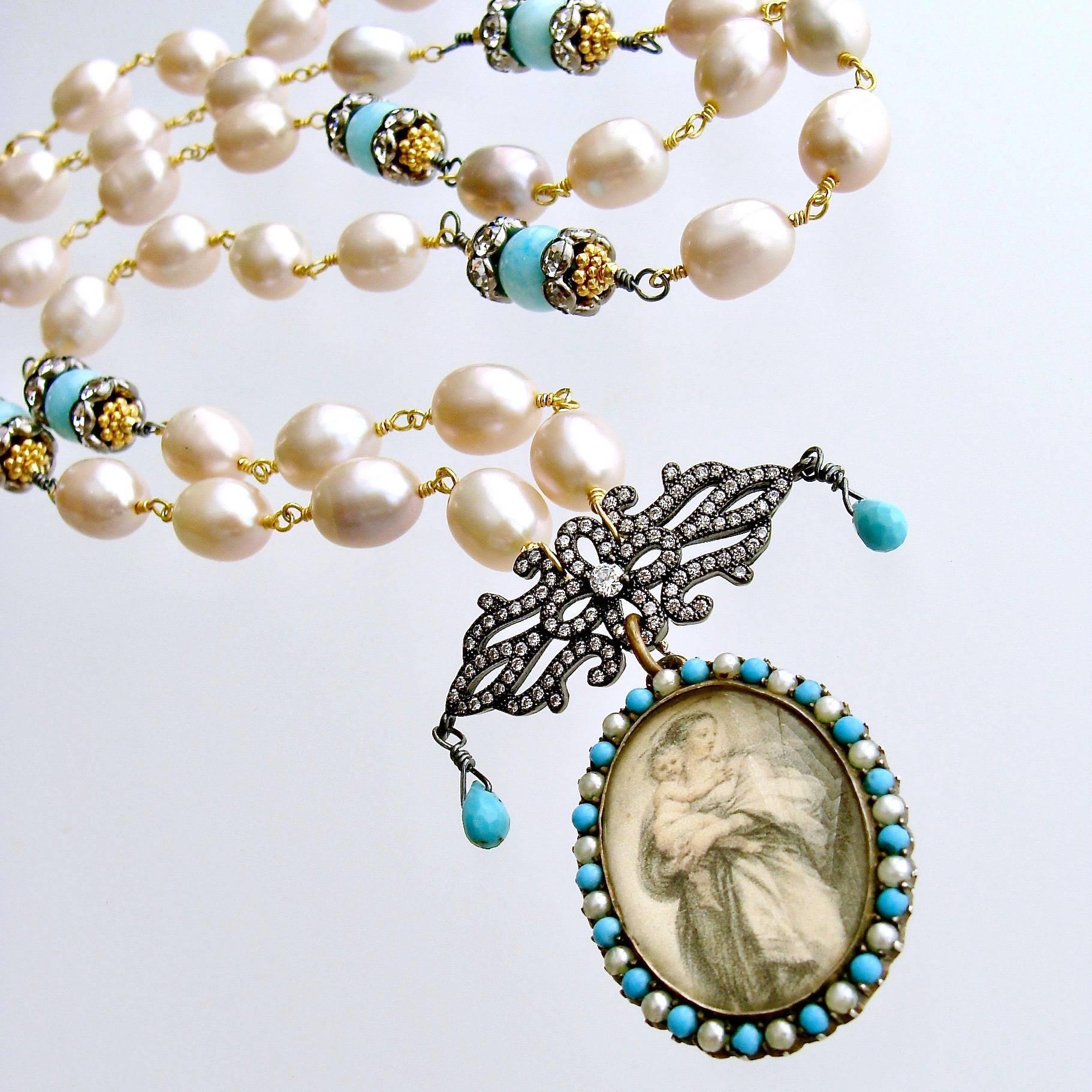 Madonna And Child Necklace.

Silky blush pink Baroque pearls are rhythmically intercepted with stations of pale aqua amazonite, flanked by mixed metals of oxidized silver and gold vermeil crystal rondelles.  This gorgeous color combination leads to