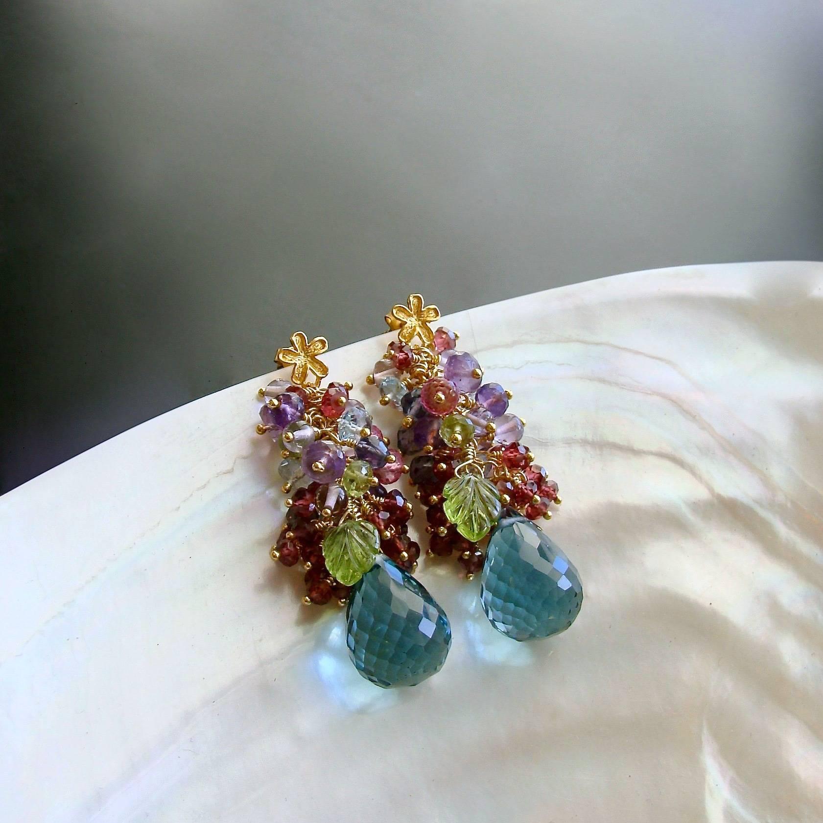 Fleur Earrings.

After a harsh and cold winter, everyone is ready for the happy colors of spring and these earrings don’t disappoint.  A cacophony of spring colors continues to be mixed with the darker colors of the garden, for a jaw dropping