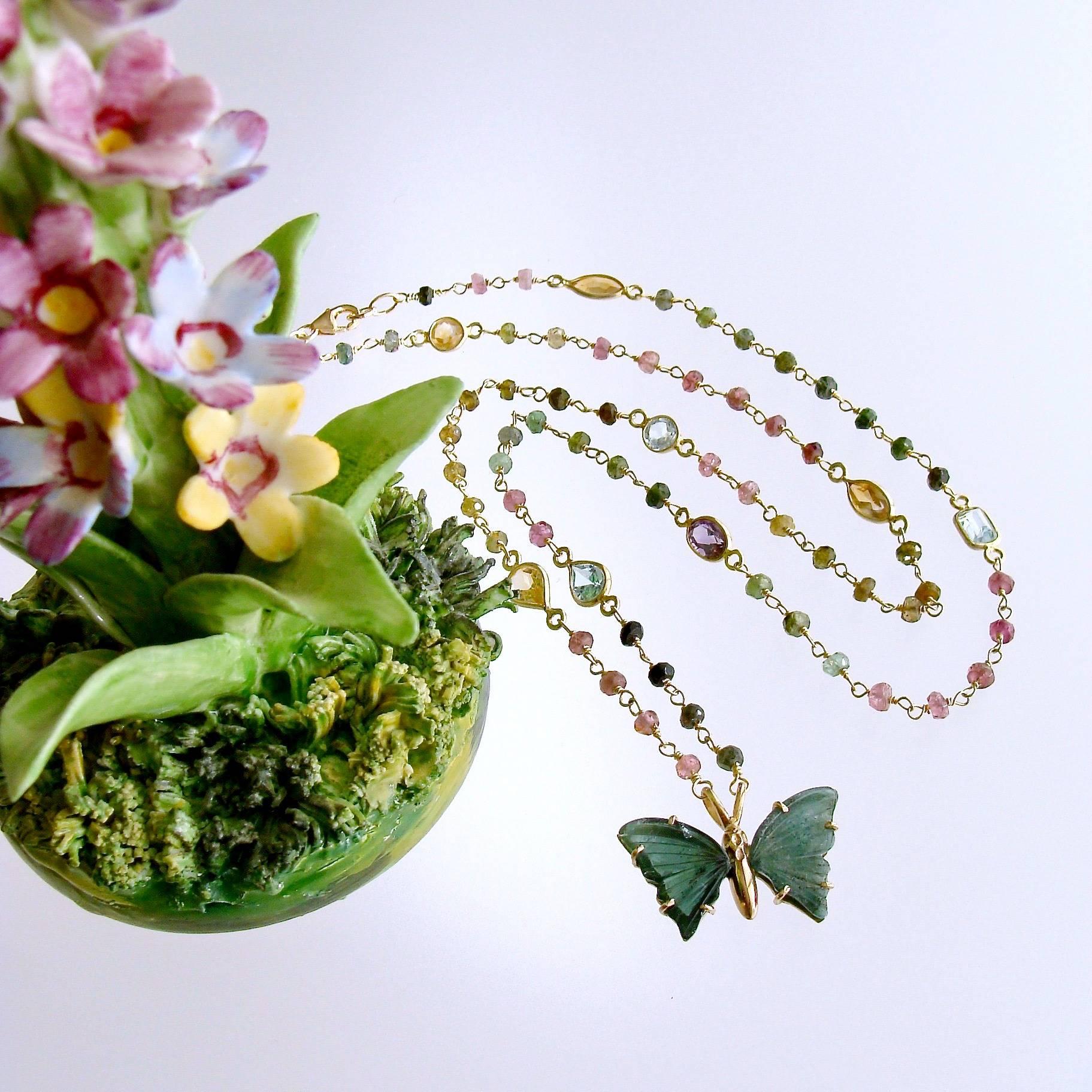 Le Papillon XI Necklace.

This stunning butterfly pendant with blue/green watermelon tourmaline wings, was designed to showcase the unique beauty of the tourmaline slices and has been mounted in a gold vermeil frame.  It has been married to a