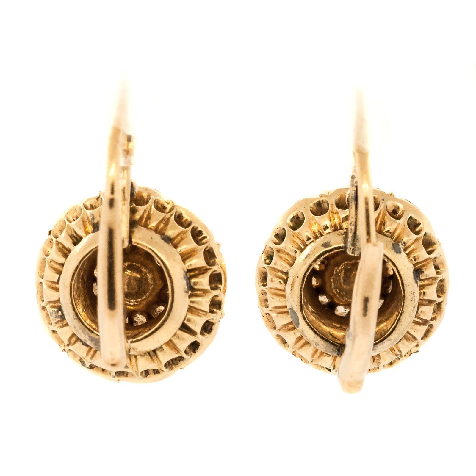 Coveted circa 1910 cluster earrings set with five carats of brilliant Rose Cut Diamonds. 