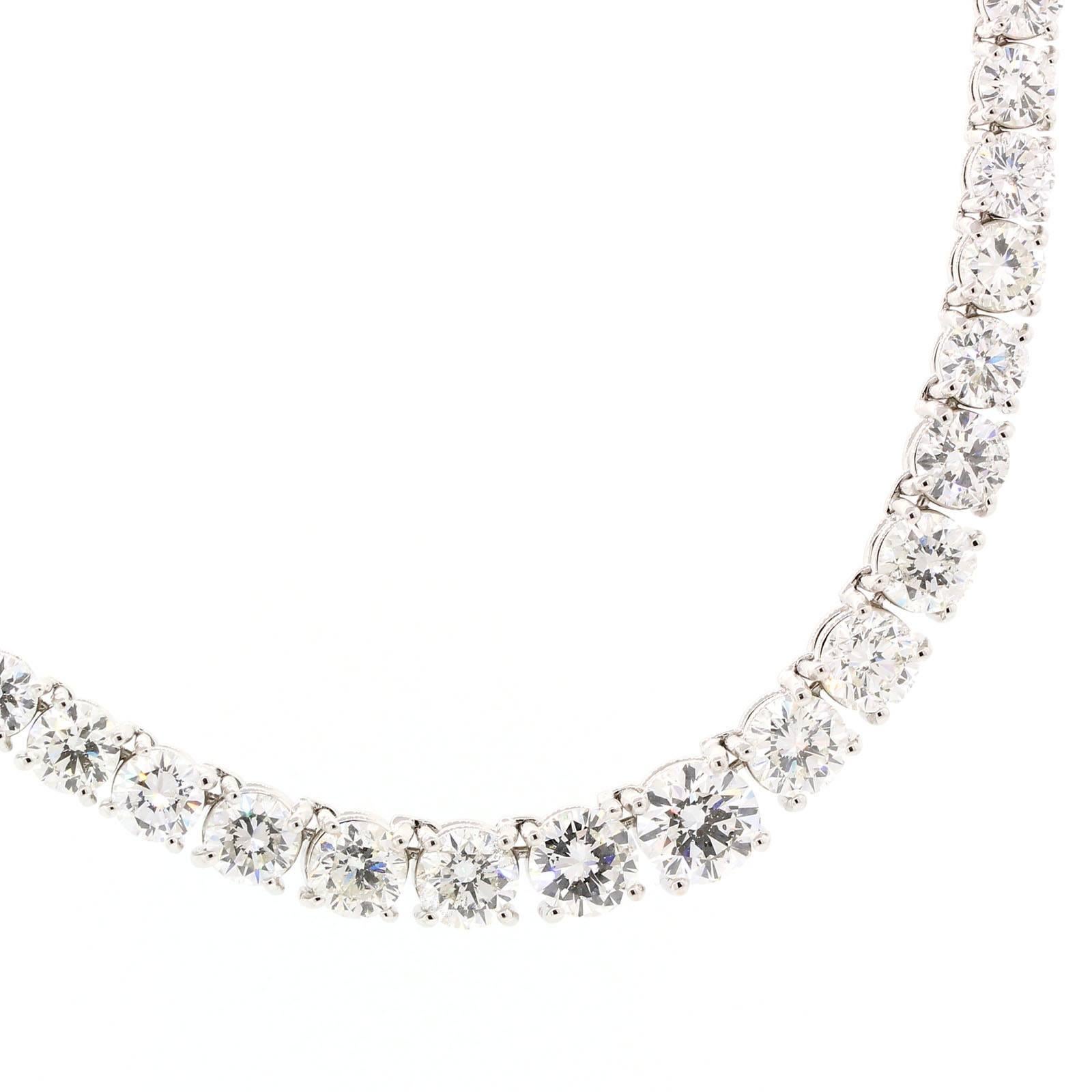 Gorgeously brilliant Riviere necklace.  Set with twenty nine carats of graduating Round Brilliant Cut Diamonds.  All diamonds are of G/H color - VS1/VS clarity and are prong set in  double wire settings. 