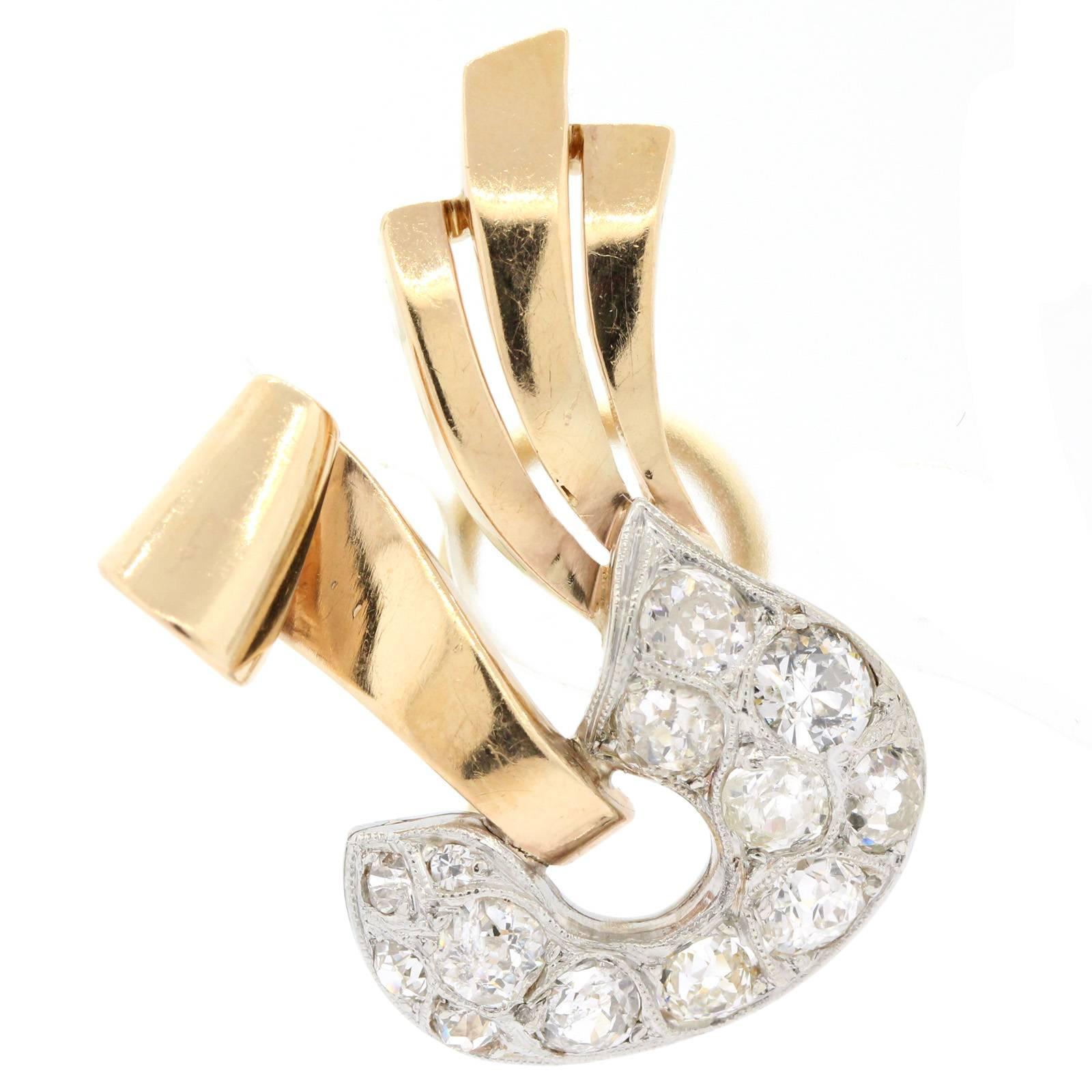 These Retro platinum and 14KT rose gold earrings are set with over four carats of old Mine and European Cut Diamonds  The designed like bows & ribbons pupping out sparkling basket!