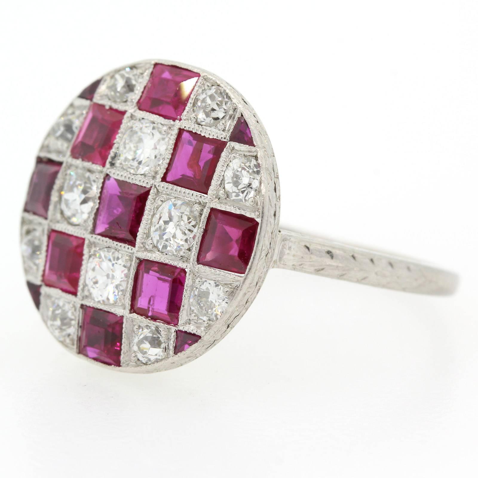 A unique checker design 1920s platinum ring set with nine square cut Burma Rubies and one carat fifteen of Old European Cut Diamonds of H color - VS clarity.  The setting is accented with hand engraving wheat design and enhanced with time worm