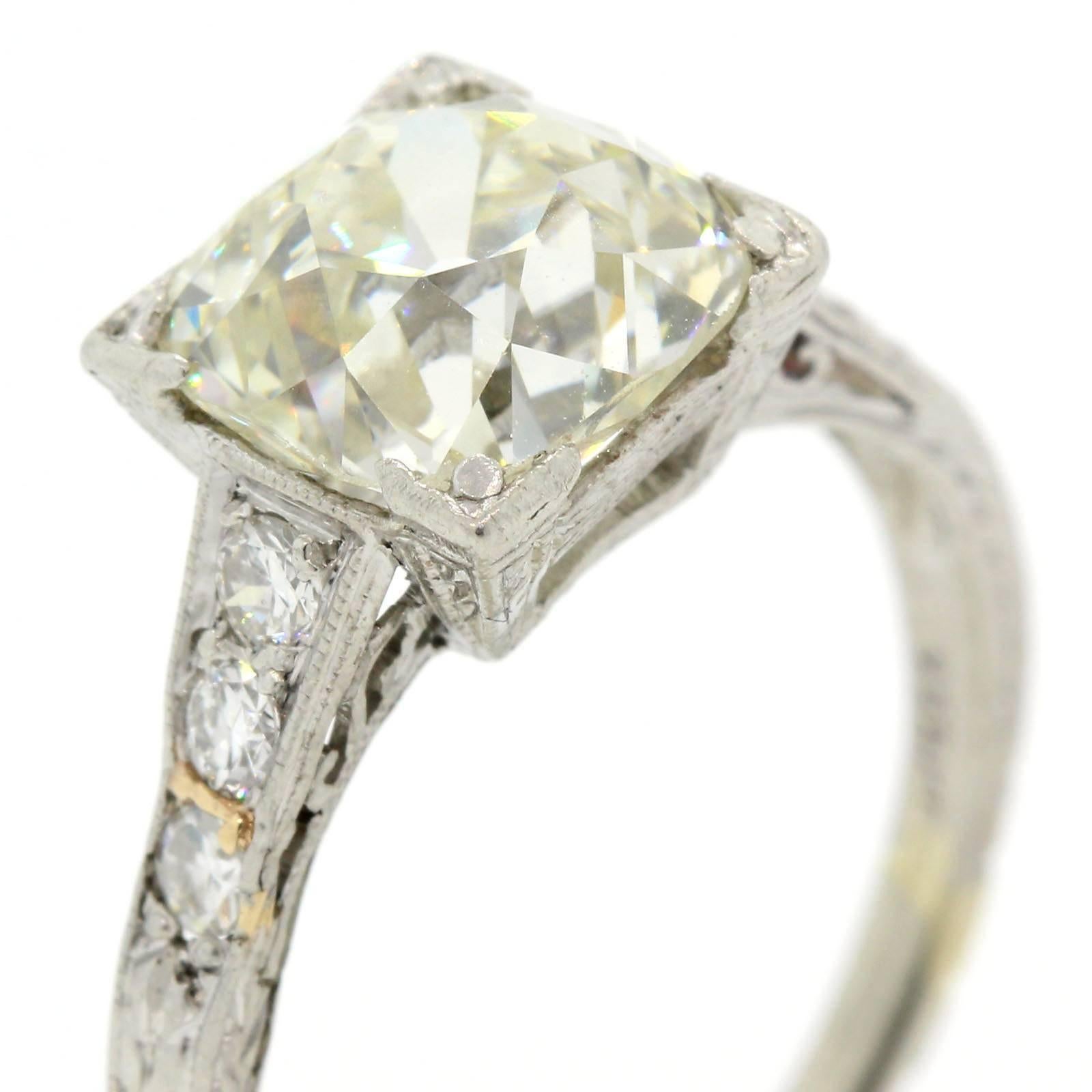 A timeless platinum ring featuring a E.G.L.  US 2.67 carat Old European Cut Diamond of K color - VS2 clarity.  The coveted platinum setting is accented with 0.22 carat of Transitional Cut Diamonds and is enhanced with beautifully preserved hand