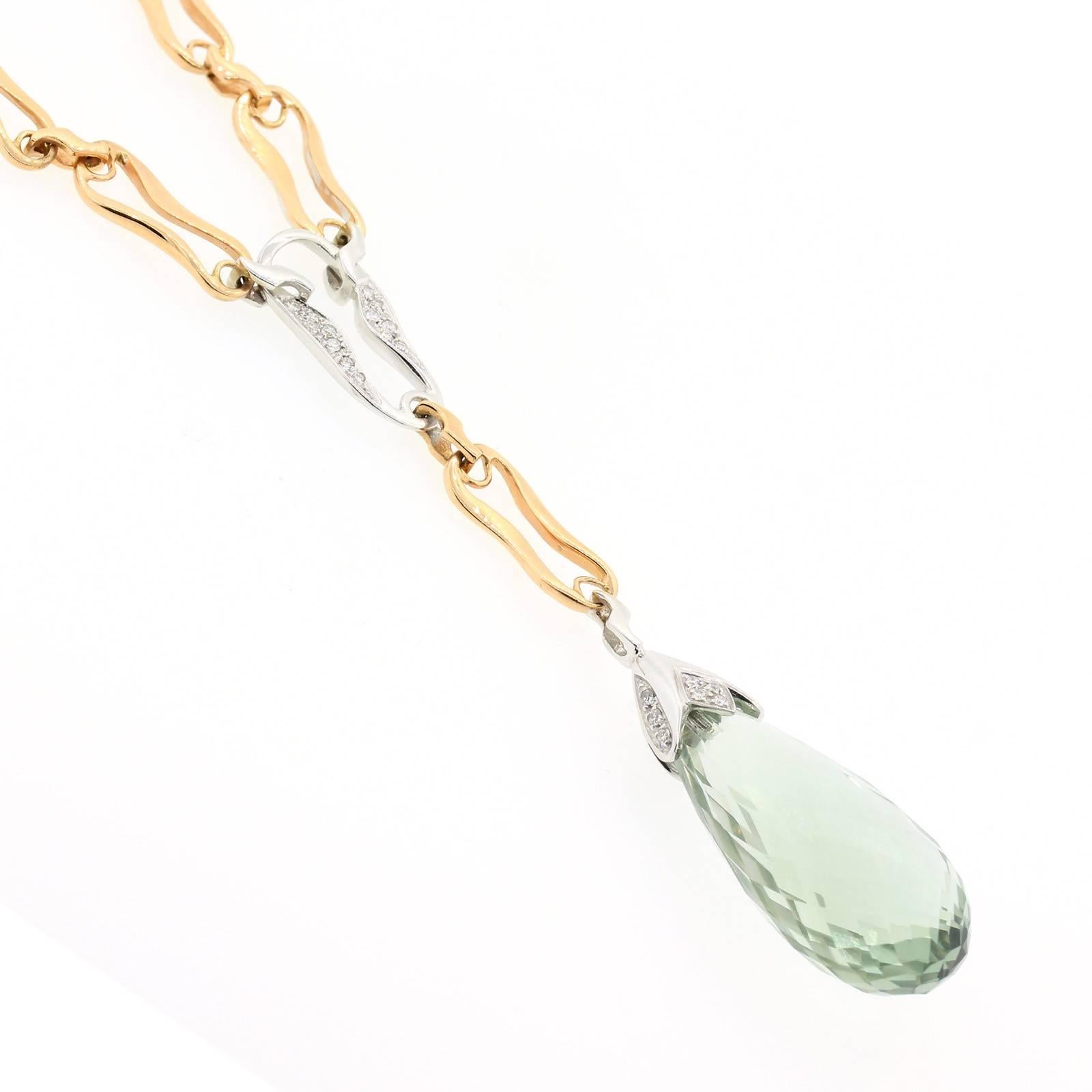 Italian made 18KT  rose gold necklace featuring a 30 carat Briolette cut Green Quartz.  The Briolette is suspended from an 18Kt white gold cup accented with  Round Brilliant Cut Diamonds, and curvy ope links.  One of the links is of white gold