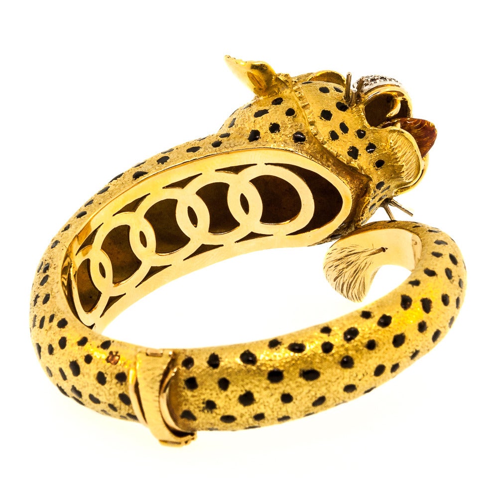 A classically expressive piece from the 1970s, the Jaguar bracelet is 18 KT Yellow Gold. What is special about this piece is the attention to detail as the figurine comes to life! The animated Jaguar features Single Cut Diamonds on its snout and is